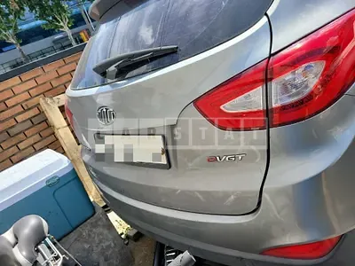 Photo 1 of 14: 2014 Hyundai Tucson, VIN KMHJT81VBFU996949 — Korean insurance auction
