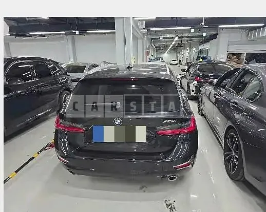 Photo 2 of 11: 2021 BMW 320i Touring — Korean insurance auction