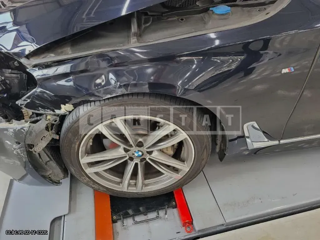 Photo 2 of 9: 2018 BMW 740Ld xDrive, VIN WBA7G8108JG785168 — Korean insurance auction