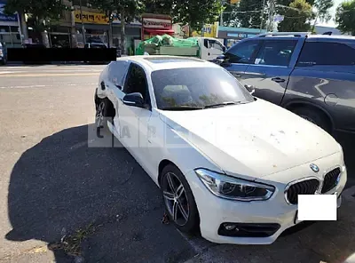 Photo 1 of 18: 2017 BMW 118d, VIN WBA1S5105H5G76257 — Korean insurance auction