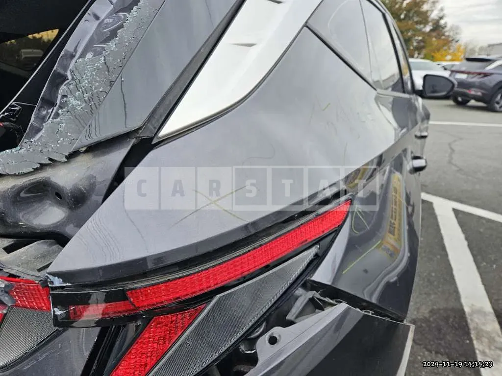 Photo 2 of 26: 2021 Hyundai Tucson, VIN KMHJE81CBMU014743 — Korean insurance auction
