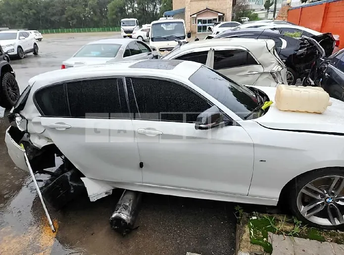 Photo 2 of 12: 2018 BMW 118d, VIN WBA1S5109J5K36237 — Korean insurance auction