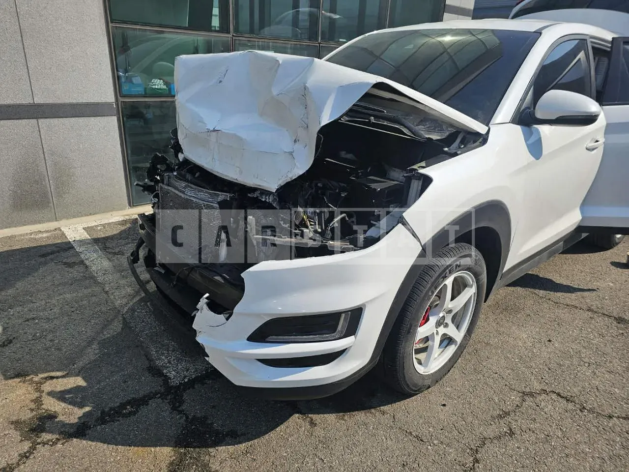 Photo 2 of 42: 2018 Hyundai Tucson, VIN KMHJ3812GKU922110 — Korean insurance auction