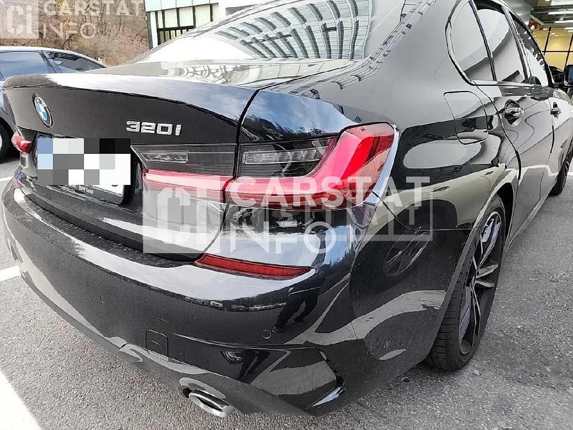 Photo 2 of 13: 2022 BMW 320i, VIN WBA5X5101NFN04989 — Korean insurance auction