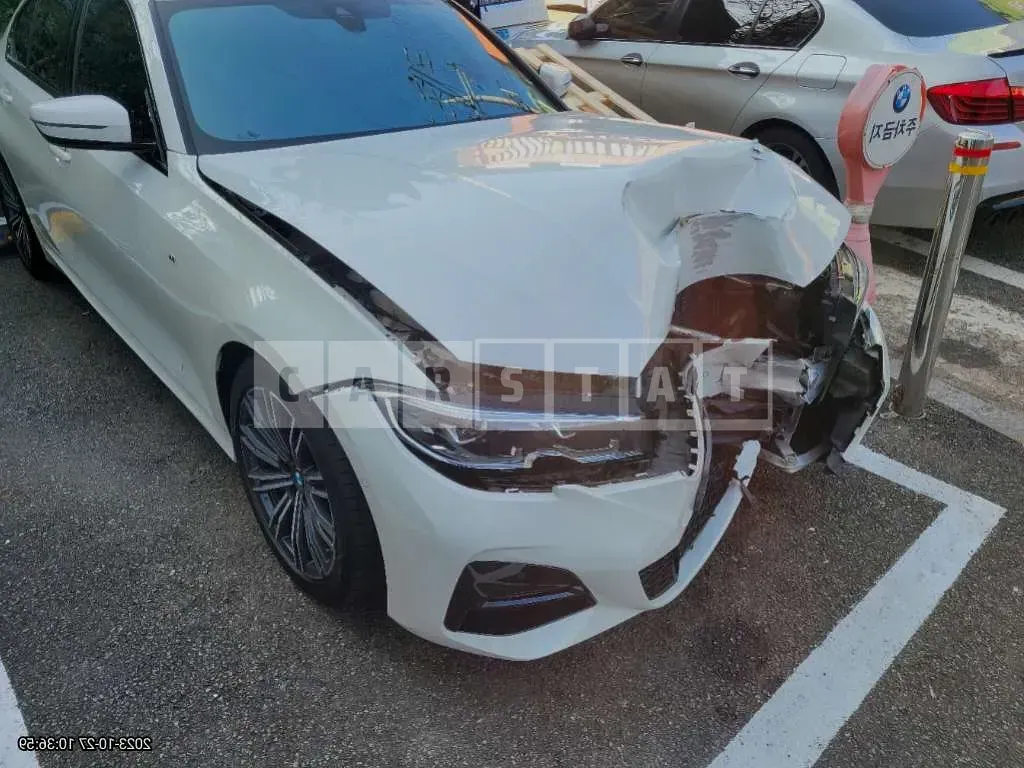 Photo 2 of 9: 2021 BMW 320i, VIN WBA5X5104MFL14649 — Korean insurance auction