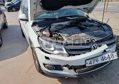 Photo 1 of 12: 2015 Volkswagen Tiguan 2.0 TDI Blue Motion, VIN WVGZZZ5NZFW560449 — Korean insurance auction