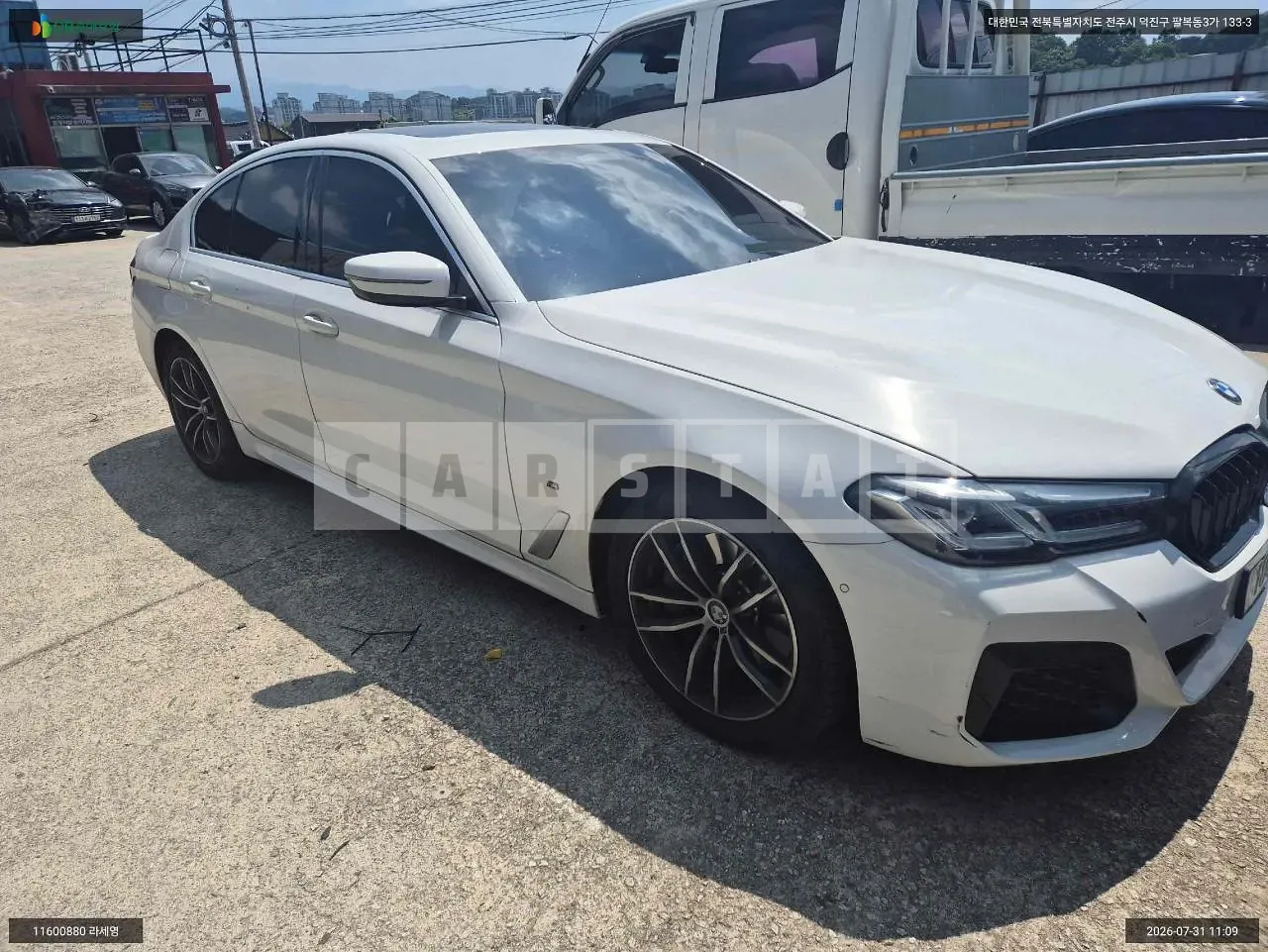 Photo 2 of 24: 2022 BMW 520i, VIN WBA11BH03NWX61933 — Korean insurance auction