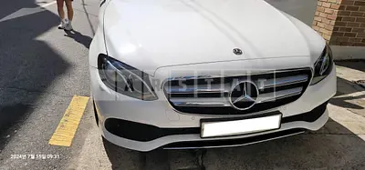 Photo 1 of 12: 2017 Mercedes-Benz E200, VIN WDDZF4CB3HA272631 — Korean insurance auction