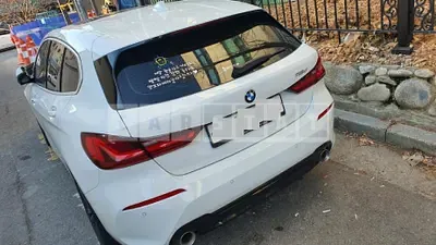 Photo 1 of 10: 2020 BMW 118d Sport, VIN WBA7M9101L7G23774 — Korean insurance auction