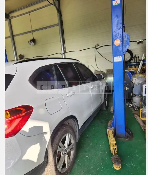 Photo 2 of 12: 2016 BMW X1 xDrive 18d, VIN WBAHT9101G5F16684 — Korean insurance auction