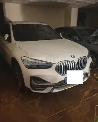 Photo 1 of 13: 2021 BMW X1 xDrive 20i, VIN WBA11DG09M5T19742 — Korean insurance auction