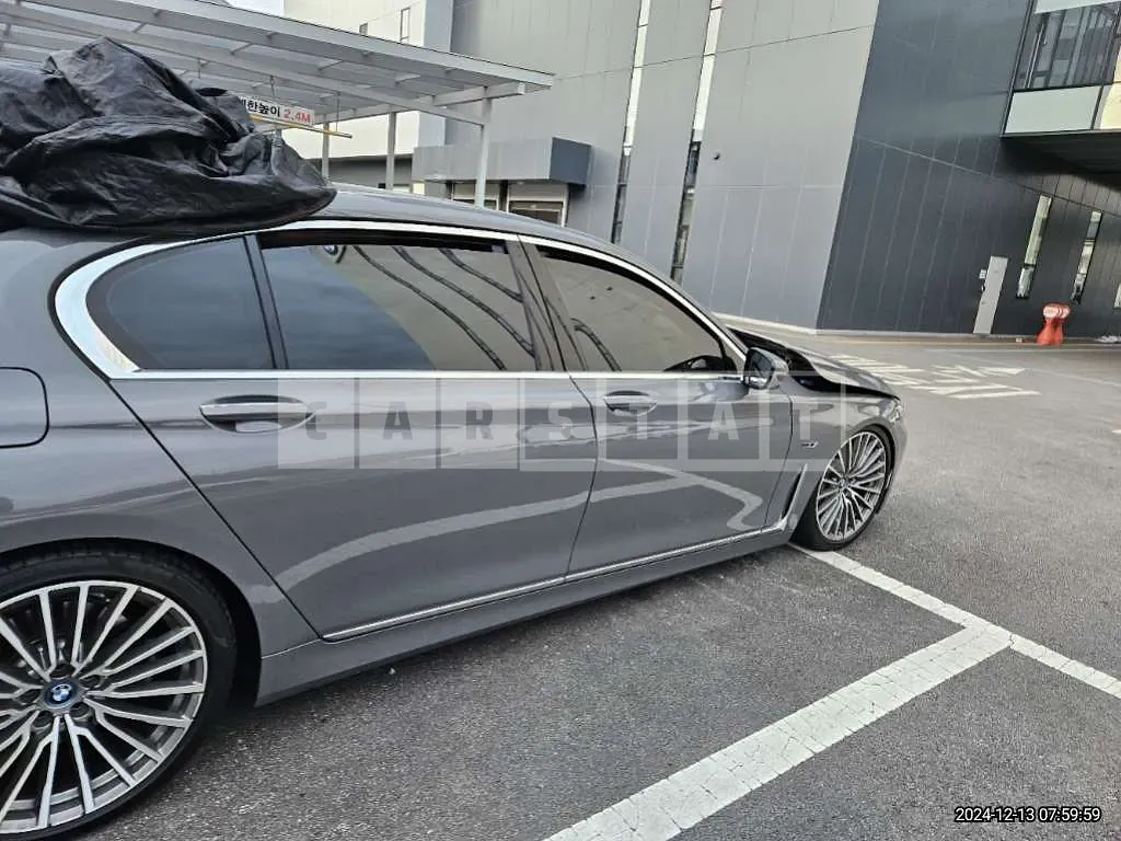 Photo 2 of 32: 2022 BMW 745e iPerformance, VIN WBA7W2108NCH74655 — Korean insurance auction