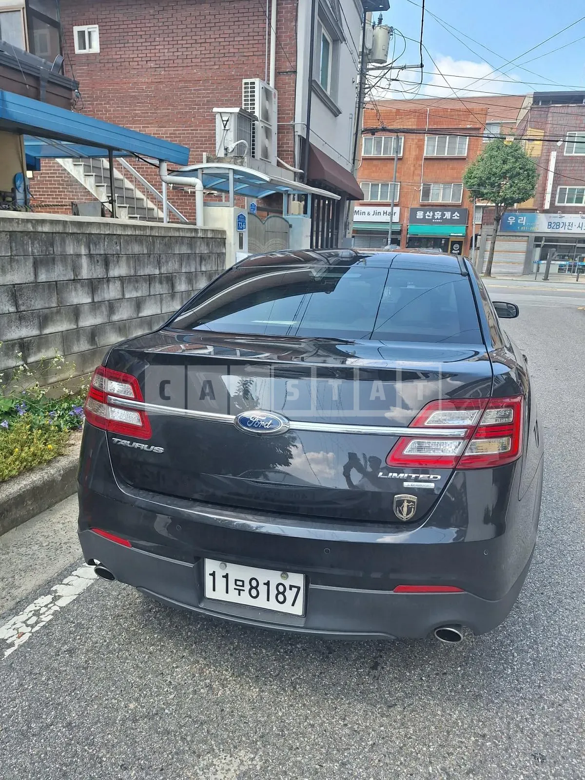 Photo 2 of 5: 2015 Ford Taurus (6th Gen) 2.0 Echo Boost Limited, VIN 1FAHP2F96FG140527 — Korean insurance auction