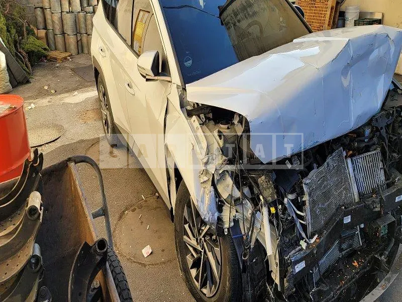 Photo 2 of 16: 2021 Hyundai Tucson, VIN KMHJE811BMU016187 — Korean insurance auction
