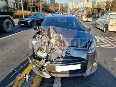 Photo 1 of 32: 2018 Toyota Prius C, VIN JTDKDTB33J1610329 — Korean insurance auction