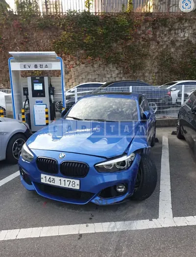 Photo 1 of 12: 2018 BMW 118d, VIN WBA1S5104J5L14424 — Korean insurance auction