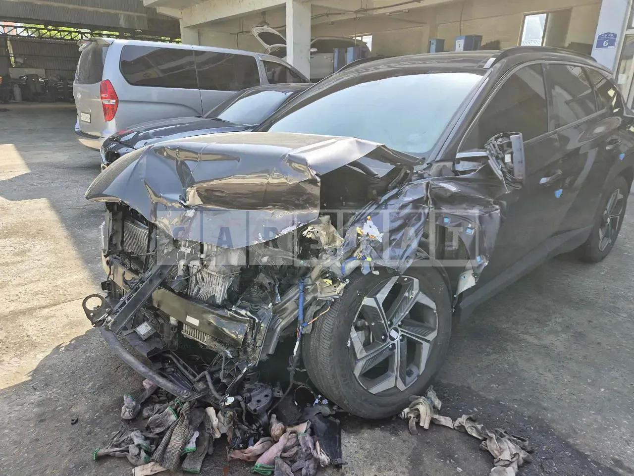Photo 2 of 19: 2022 Hyundai Tucson, VIN KMHJE81CBNU116932 — Korean insurance auction