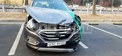 Photo 1 of 8: 2015 Hyundai Tucson, VIN KMHJT81VBFU961223 — Korean insurance auction