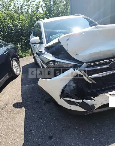 Photo 2 of 33: 2016 Hyundai Tucson, VIN KMHJ3815GGU169969 — Korean insurance auction