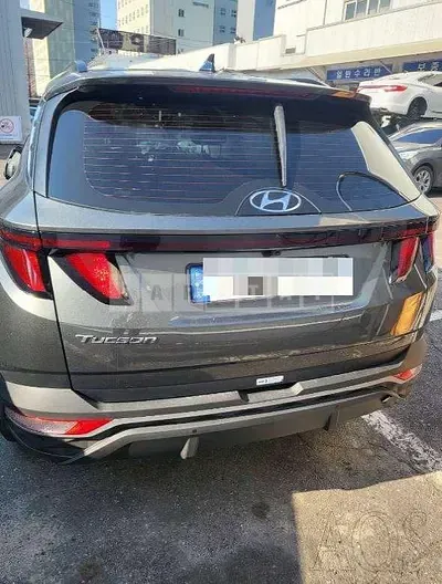 Photo 1 of 11: 2021 Hyundai Tucson, VIN KMHJC81BGMU072883 — Korean insurance auction