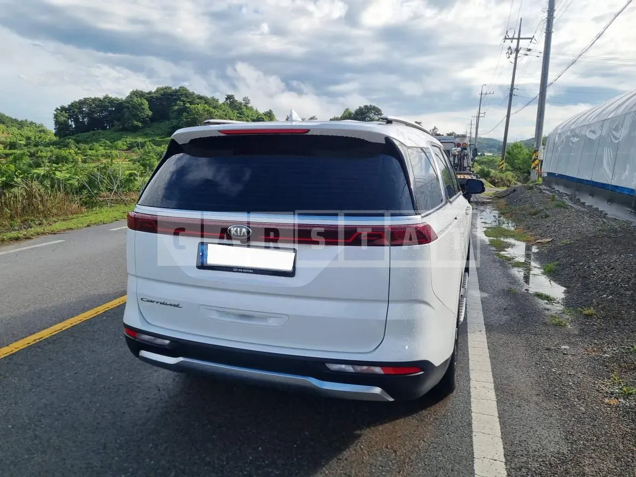 Photo 2 of 5: 2021 Kia Carnival, VIN KNANE81BBMS077616 — Korean insurance auction