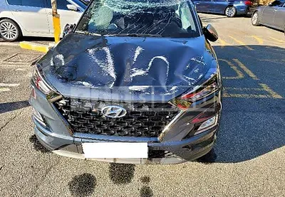 Photo 1 of 12: 2020 Hyundai Tucson, VIN KMHJ581ADLU251804 — Korean insurance auction