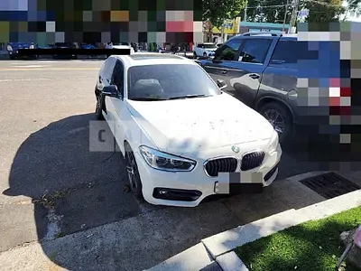 Photo 1 of 18: 2017 BMW 118d, VIN WBA1S5105H5G76257 — Korean insurance auction