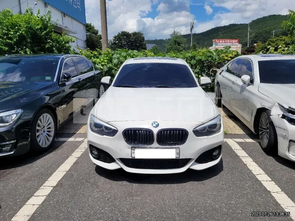 Photo 2 of 8: 2018 BMW 118d, VIN WBA1S5105J5G79679 — Korean insurance auction