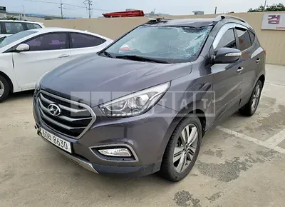 Photo 1 of 14: 2015 Hyundai Tucson, VIN KMHJT81VBFU949434 — Korean insurance auction