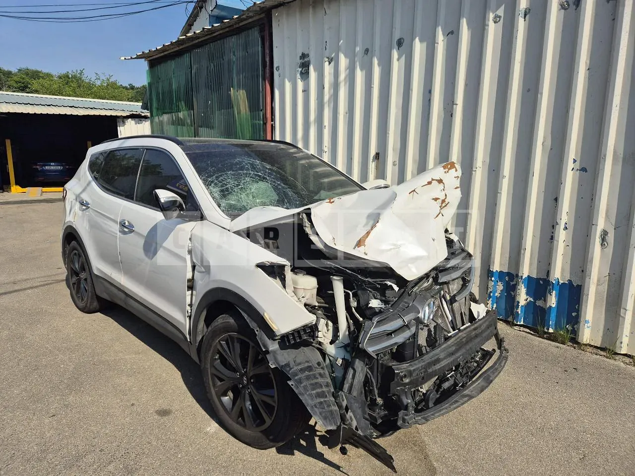 Photo 2 of 13: 2015 Hyundai Santa Fe, VIN KMHSW81UDGU580514 — Korean insurance auction
