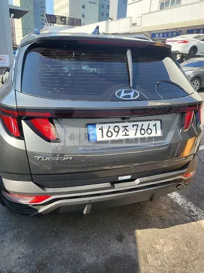 Photo 1 of 12: 2021 Hyundai Tucson, VIN KMHJC81BGMU072883 — Korean insurance auction