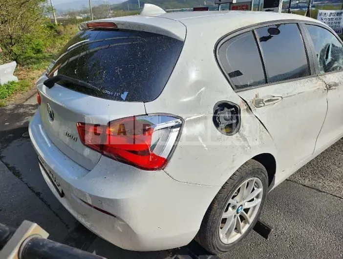 Photo 2 of 19: 2018 BMW 118d, VIN WBA1S5108J5L14846 — Korean insurance auction