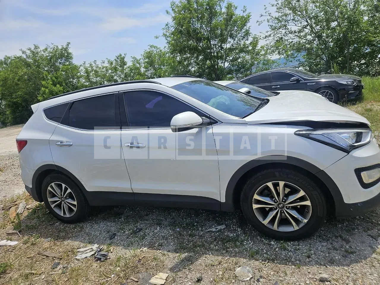 Photo 2 of 9: 2015 Hyundai Santa Fe, VIN KMHSW81UBFU495022 — Korean insurance auction