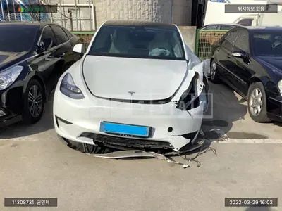 Photo 1 of 17: 2021 Tesla Model Y Long Range, VIN 5YJYGDEE1MF167484 — Korean insurance auction