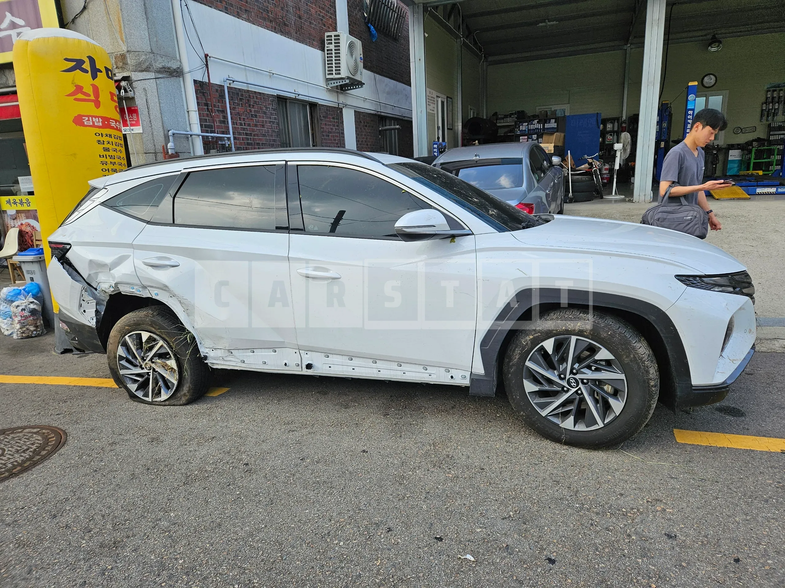 Photo 2 of 15: 2023 Hyundai Tucson, VIN KMHJE811BPU130540 — Korean insurance auction