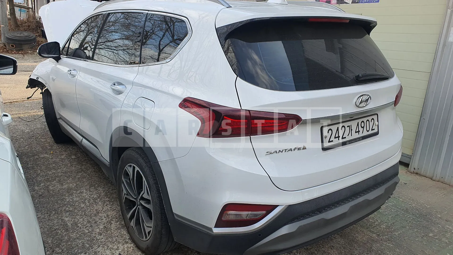 Photo 2 of 15: 2020 Hyundai Santa Fe, VIN KMHS381CBLU268557 — Korean insurance auction