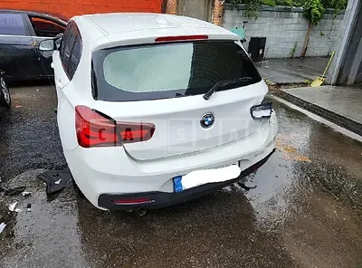 Photo 1 of 12: 2018 BMW 118d, VIN WBA1S5109J5K36237 — Korean insurance auction