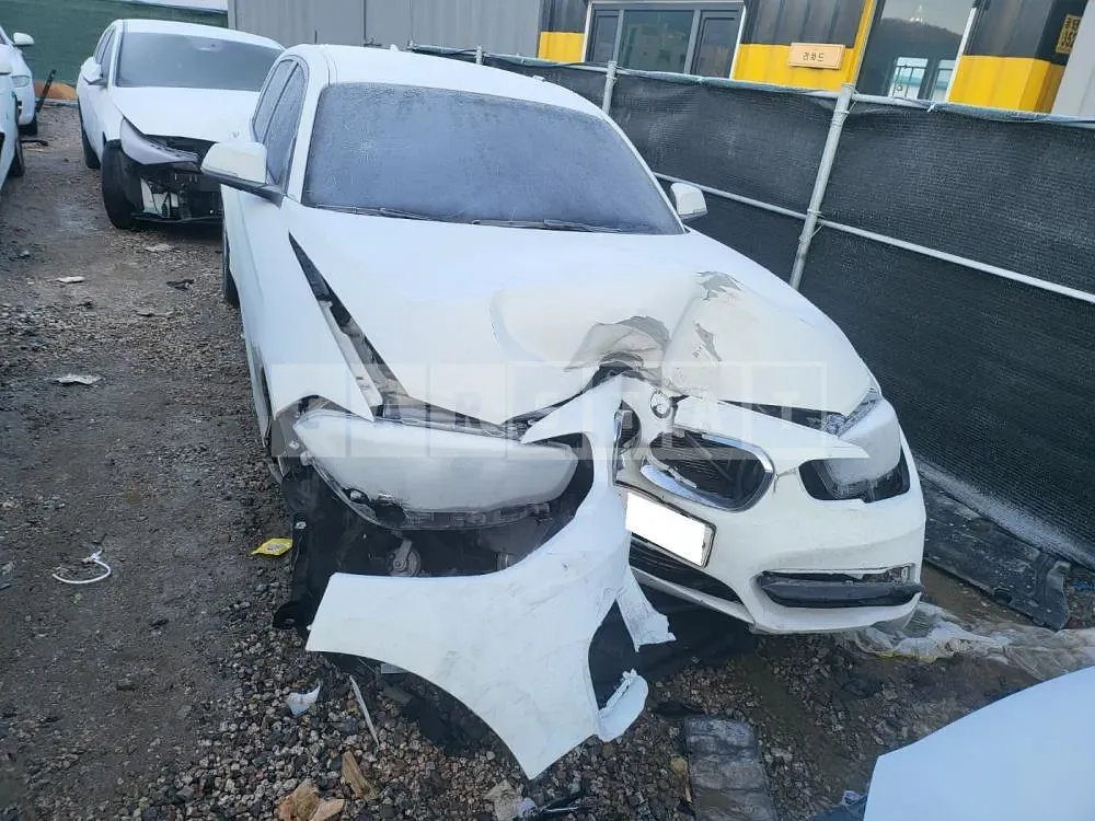 Photo 2 of 11: 2017 BMW 118d, VIN WBA1S5100HV806314 — Korean insurance auction