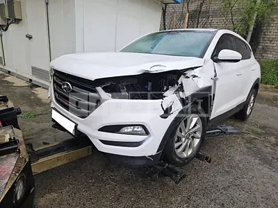 Photo 1 of 15: 2015 Hyundai Tucson, VIN KMHJ2815GGU013415 — Korean insurance auction