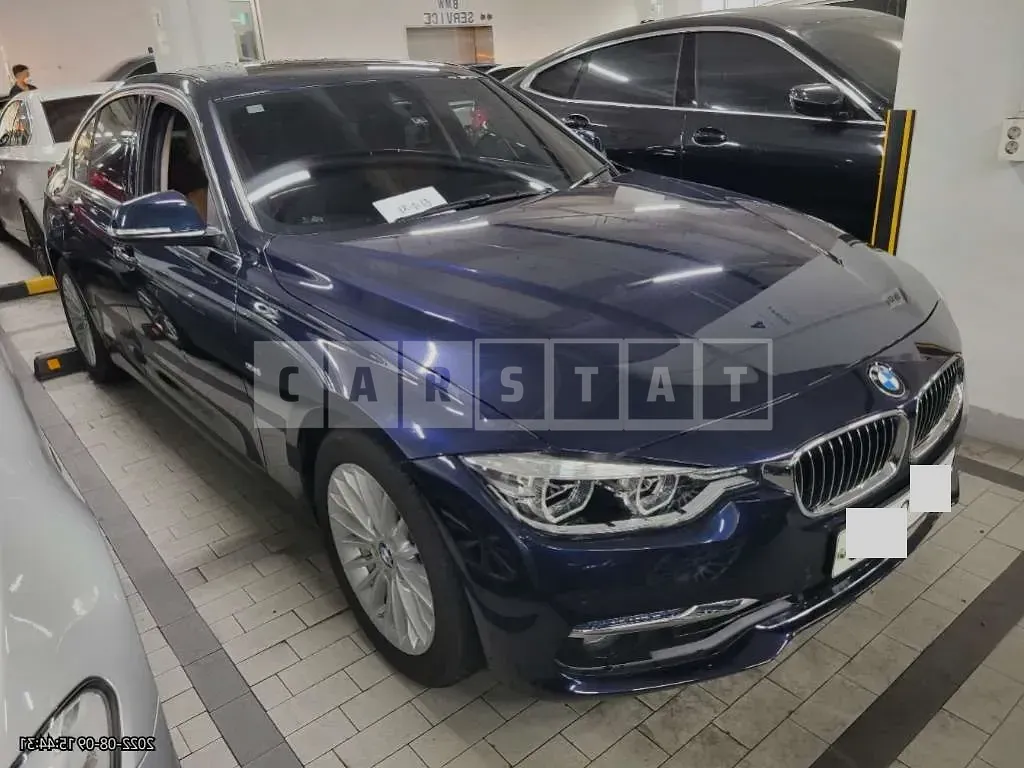 Photo 2 of 9: 2017 BMW 320i, VIN WBA8A9105HK883108 — Korean insurance auction