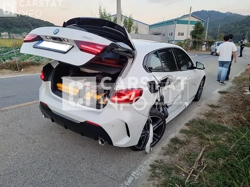Photo 2 of 25: 2022 BMW 120i, VIN WBA7L7102N7K99063 — Korean insurance auction