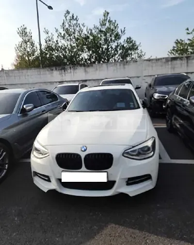 Photo 1 of 30: 2015 BMW 118d, VIN WBA1C1107FJ838543 — Korean insurance auction