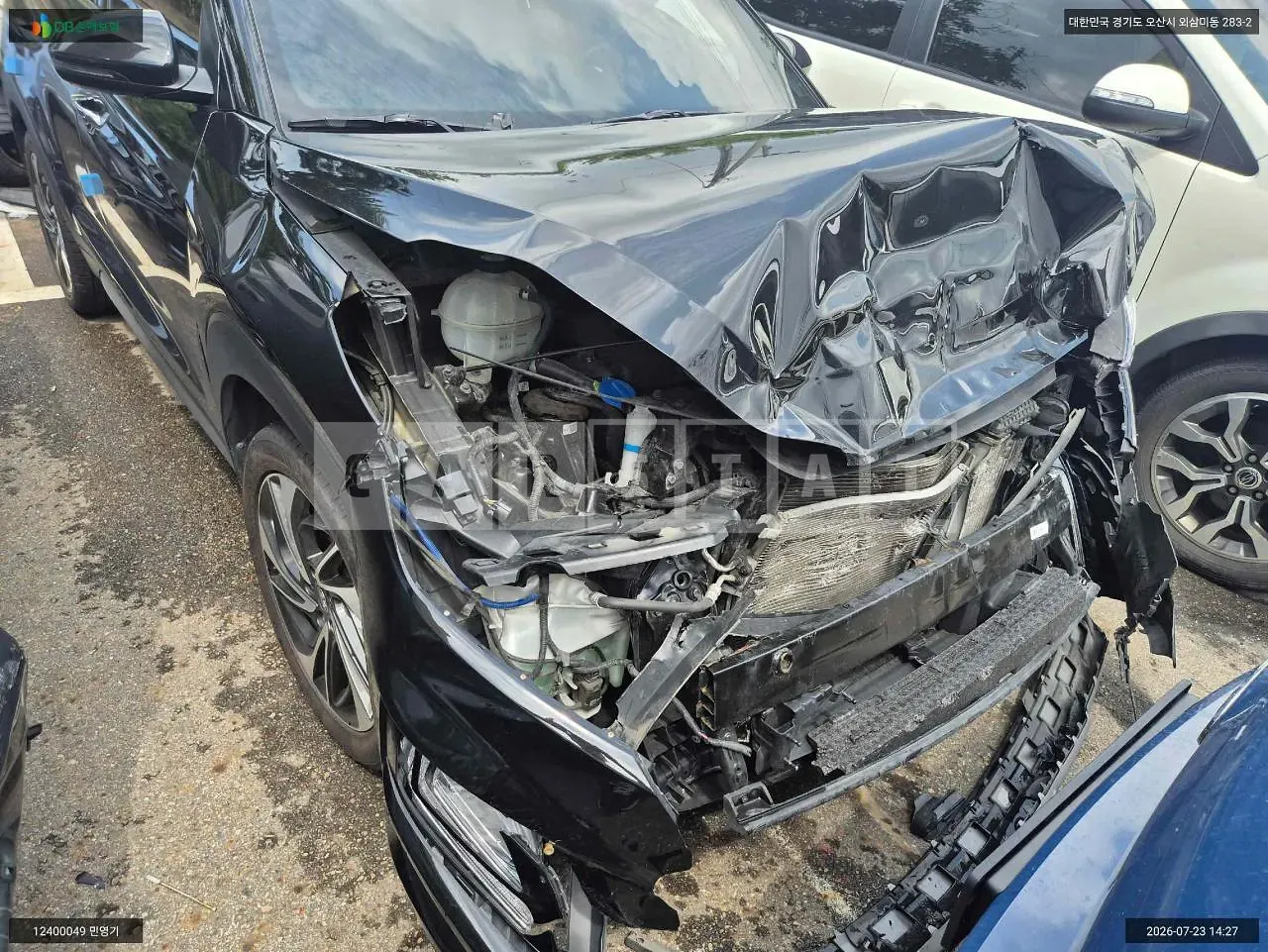 Photo 2 of 13: 2019 Hyundai Tucson, VIN KMHJ5812GKU075736 — Korean insurance auction
