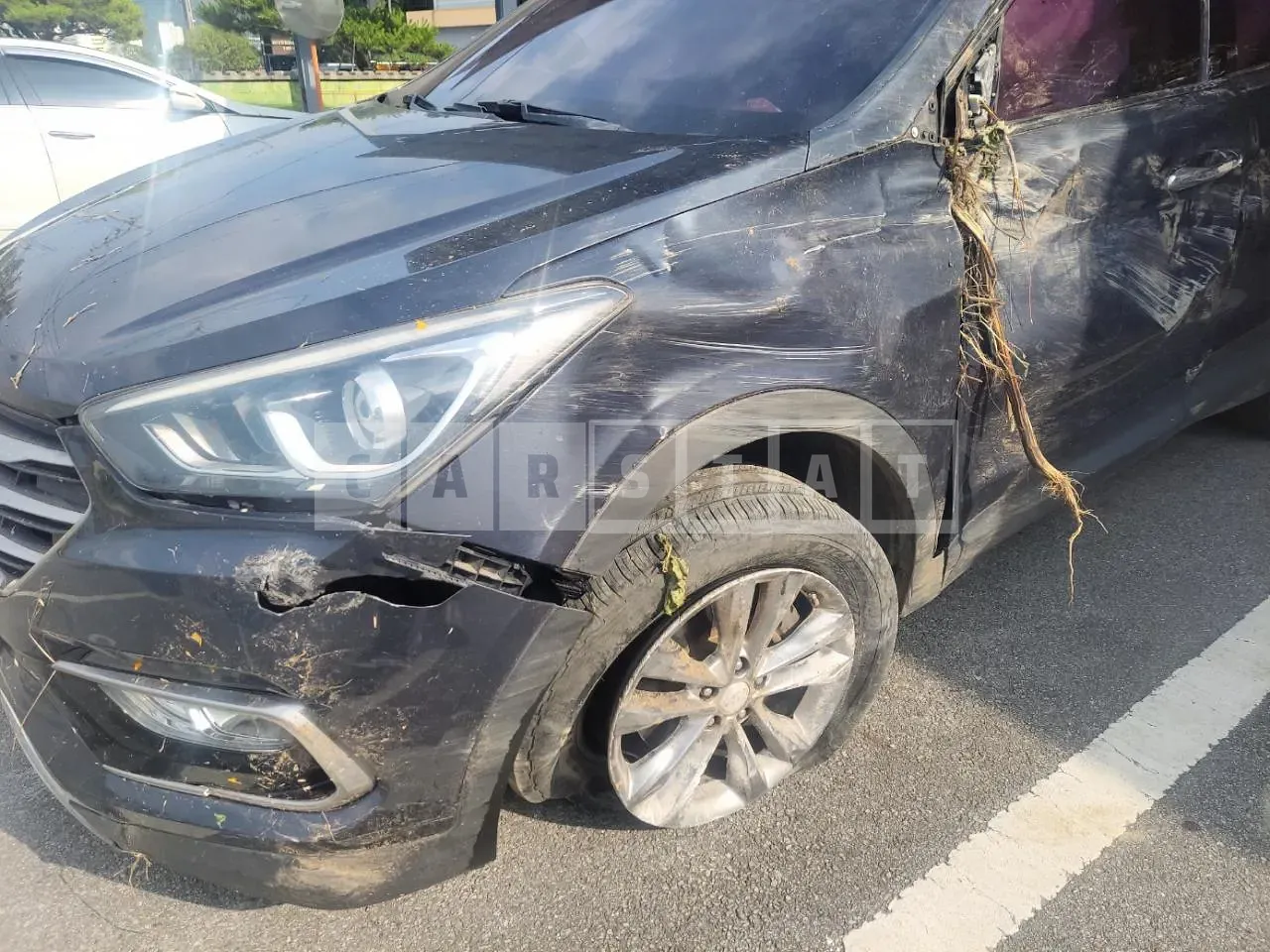 Photo 2 of 7: 2015 Hyundai Santa Fe, VIN KMHSW81UBGU593857 — Korean insurance auction