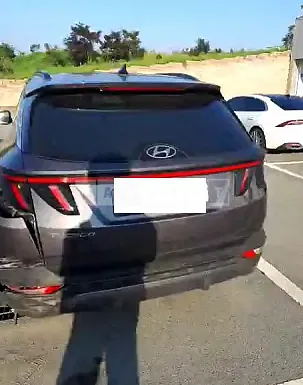 Photo 2 of 25: 2021 Hyundai Tucson, VIN KMHJE81BGMU015560 — Korean insurance auction