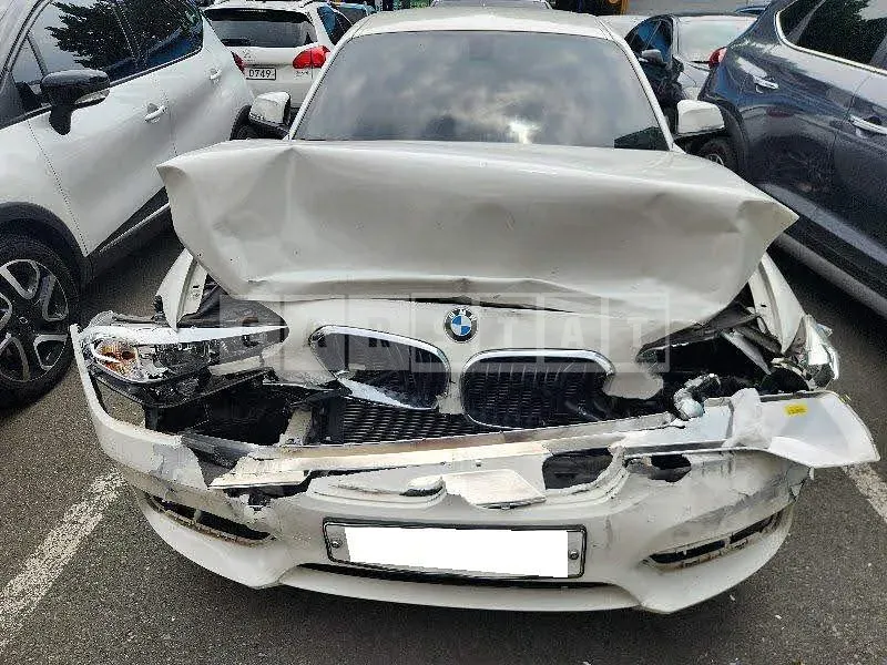 Photo 2 of 27: 2018 BMW 118d Joy, VIN WBA1S5108J5L14376 — Korean insurance auction
