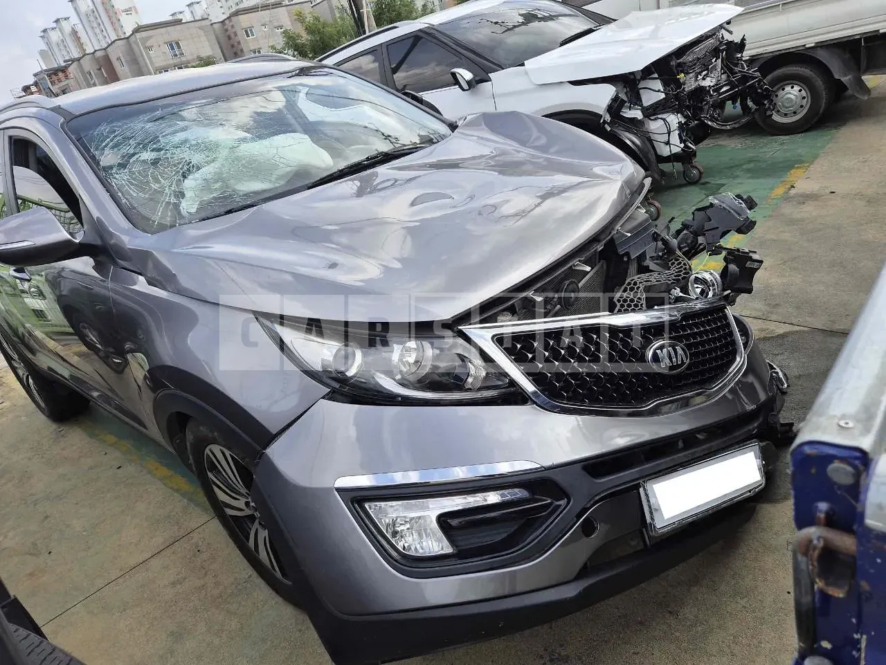 Photo 2 of 7: 2015 Kia Sportage, VIN KNAPC813DGK821325 — Korean insurance auction