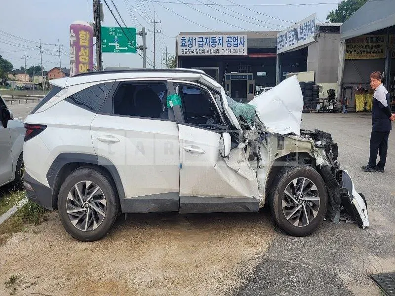 Photo 2 of 15: 2022 Hyundai Tucson, VIN KMHJC81CBNU152530 — Korean insurance auction