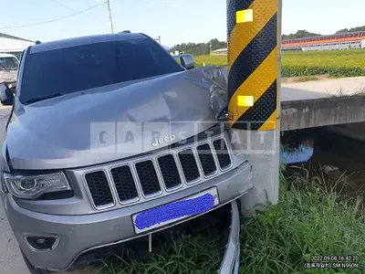 Photo 1 of 25: 2015 Jeep Straw Grand Cherokee, VIN 1C4RJFCM7FC928109 — Korean insurance auction