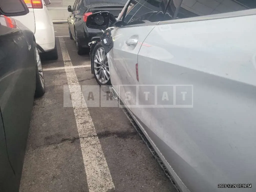 Photo 2 of 17: 2021 BMW 118d, VIN WBA7M9103M7H50396 — Korean insurance auction